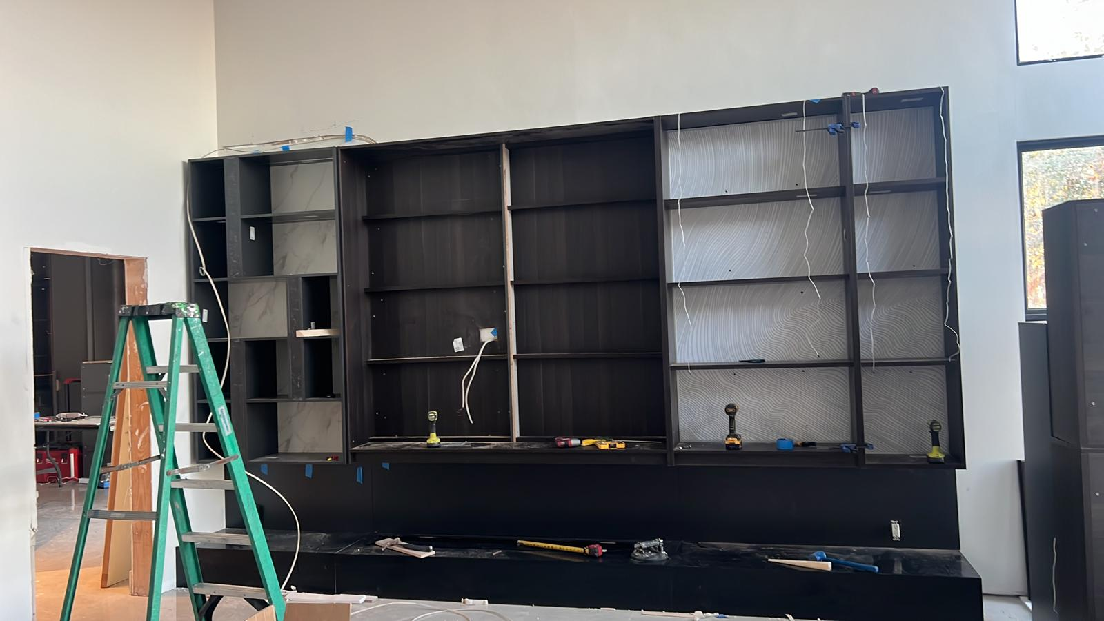 Large custom built-in media wall under construction
